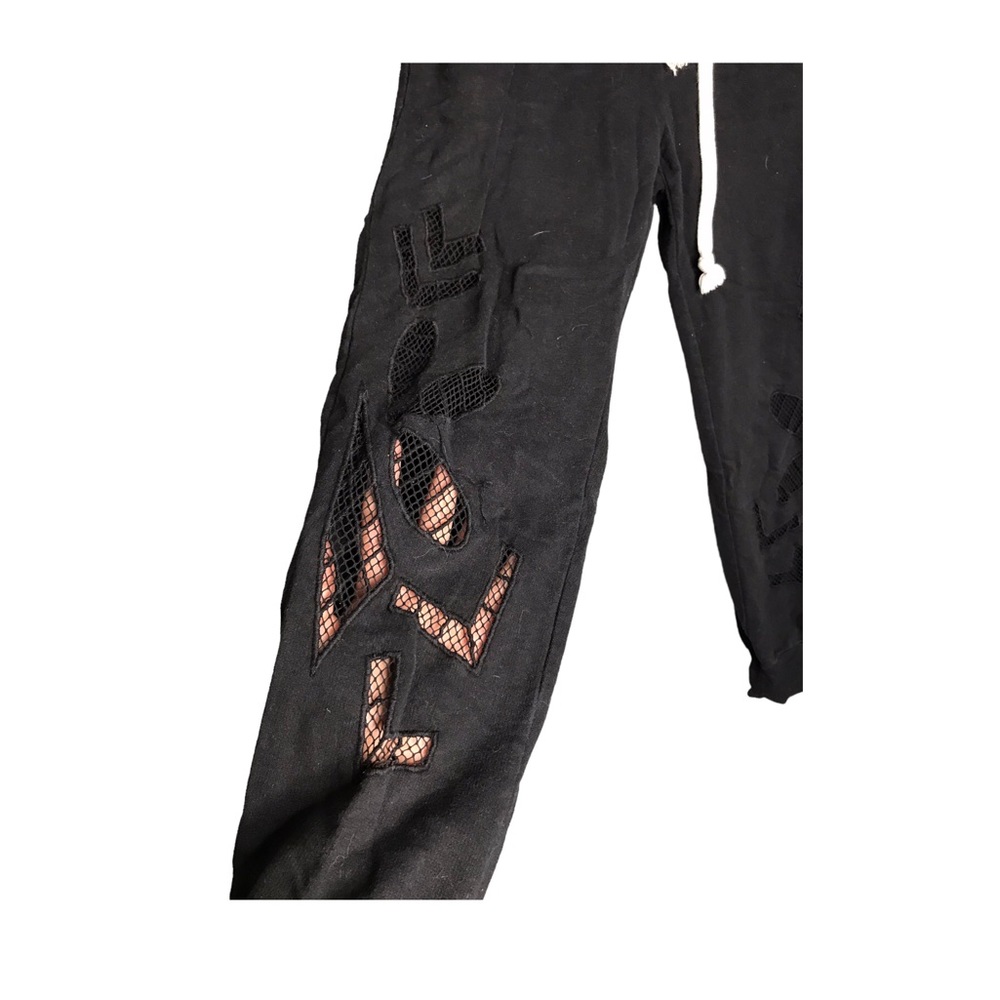 Americanable | Black floral see through bottom drawstring joggers •